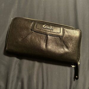 Coach black shiny leather zip around wallet